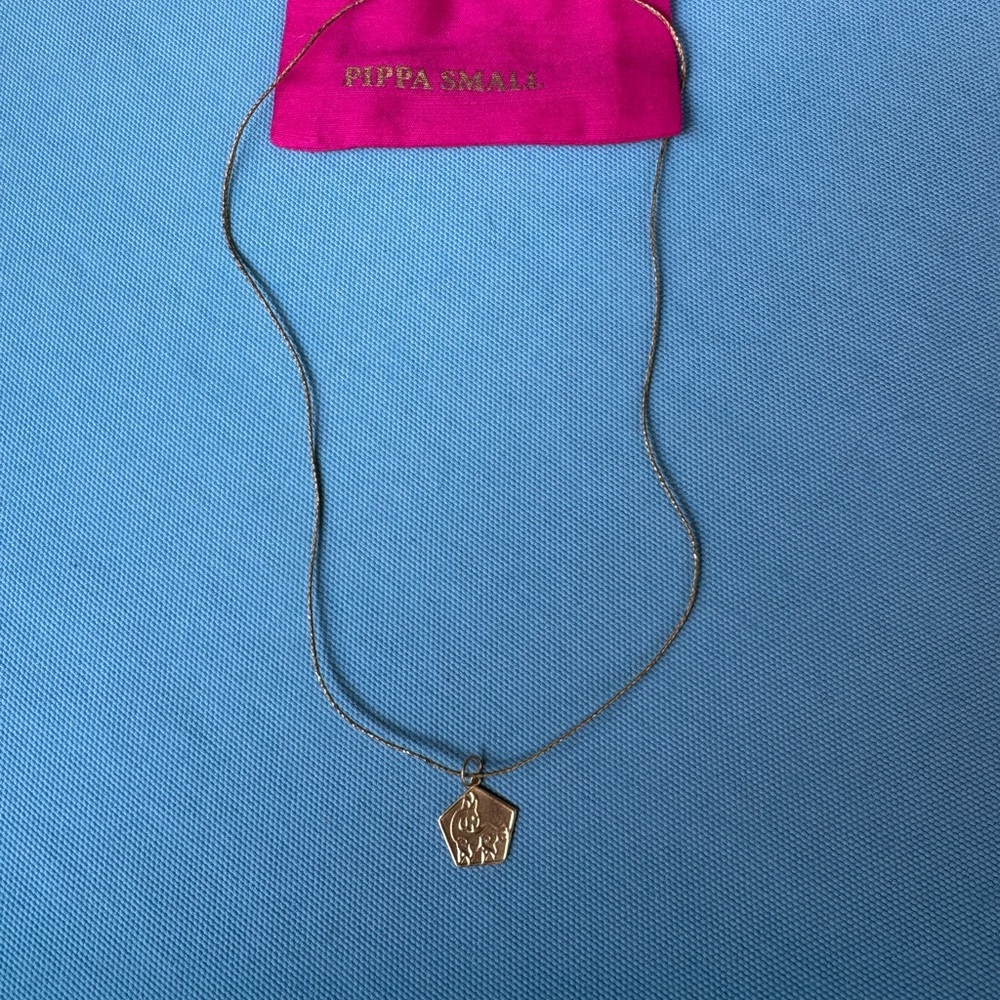 Pippa Small 18k gold Capricorn pendant on cord NWOT